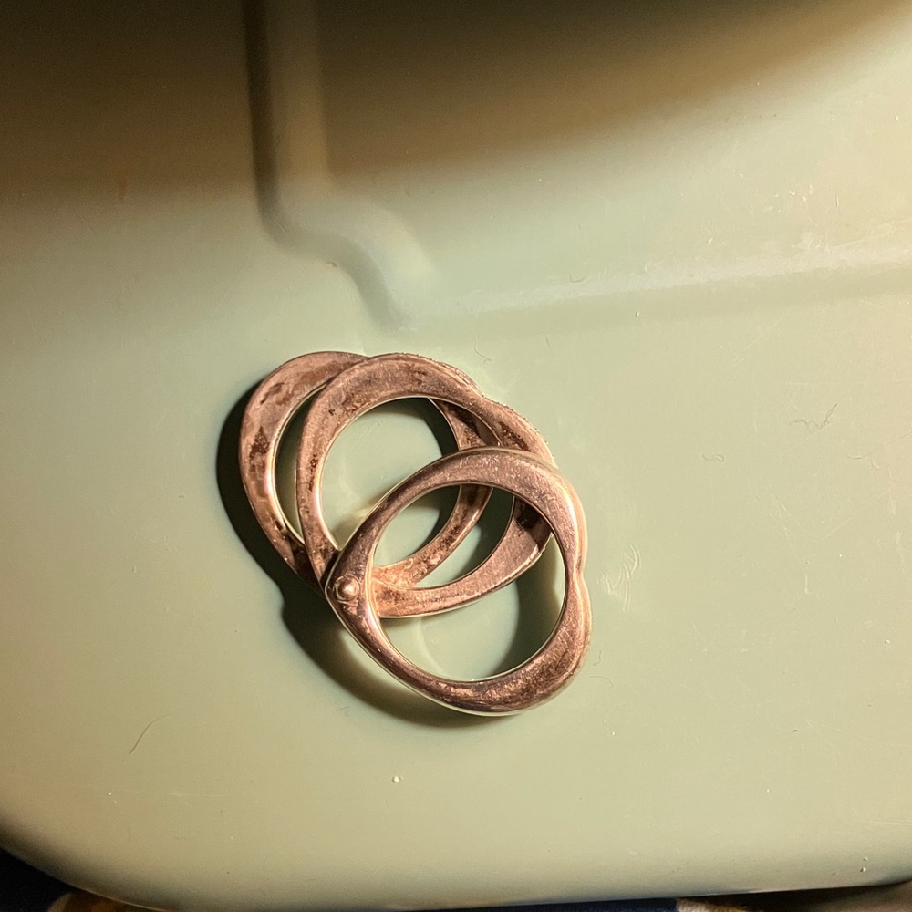 Sterling silver heart 3 in one ring with white sapphire’s 
Beautiful ! Size 8